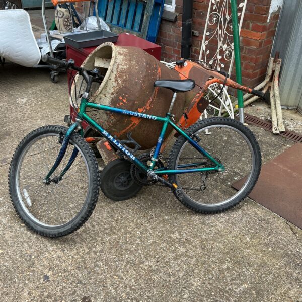 Side view of a vintage Raleigh Mustang mountain bike.