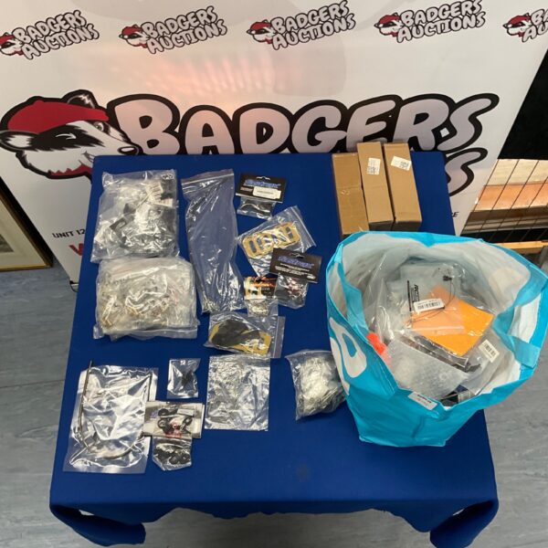 Mixed lot of RC car parts and accessories for hobbyists.
