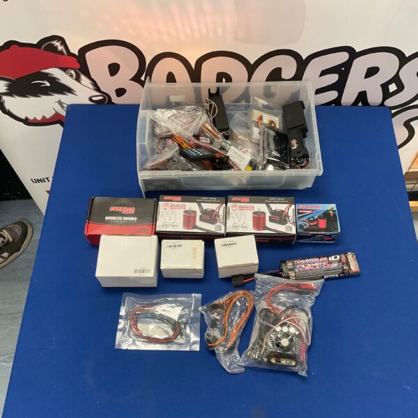 Mixed lot of RC car parts including Surpass Nobby components.