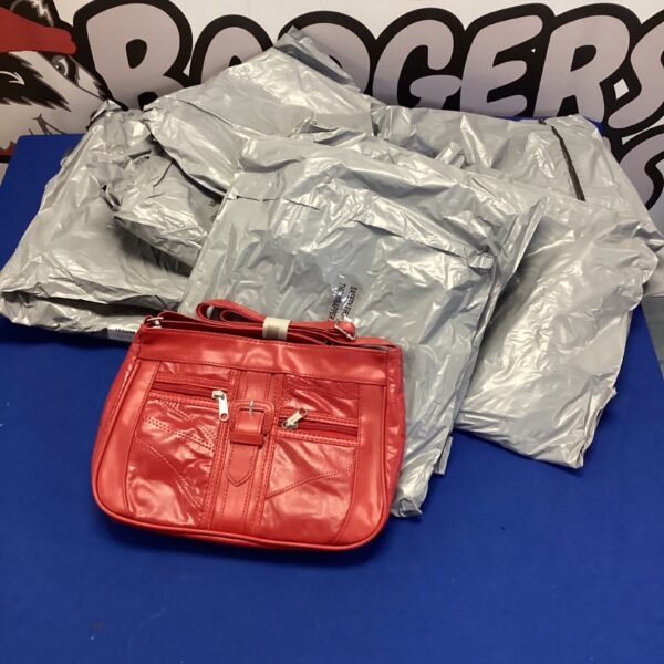 New red leather handbag from a lot of ten fashion accessories.
