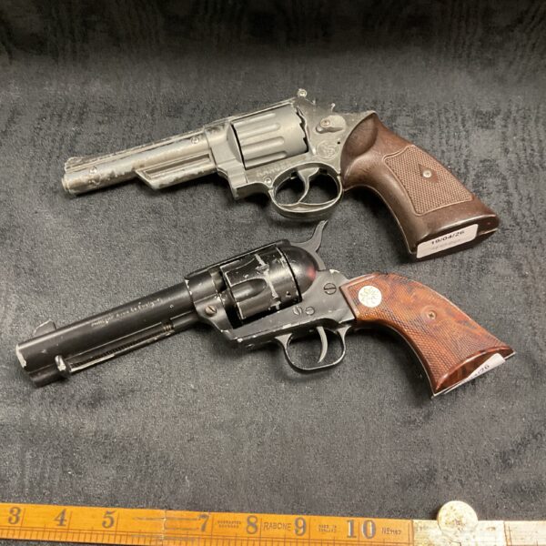 Pair of vintage replica pistols for collectors or display.