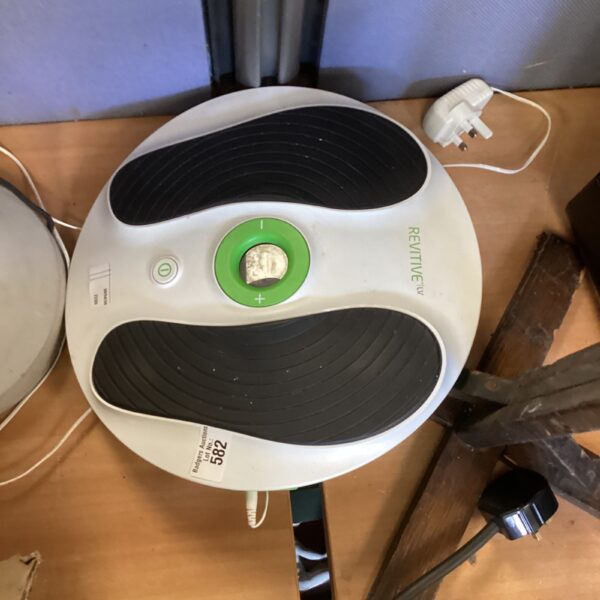 Revitive IX foot massager device for improved circulation.