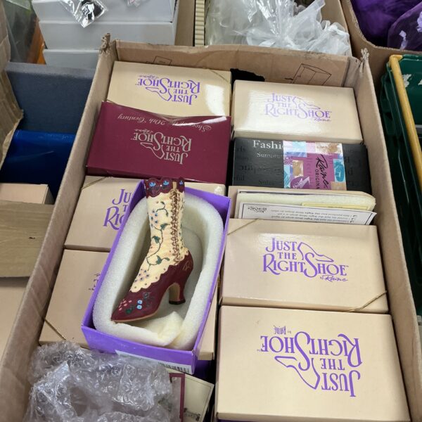 Collection of right shoes in original boxes, vintage footwear.