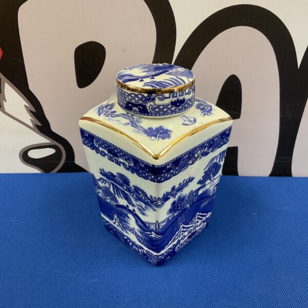 Vintage Ringtons Wade ginger jar with blue willow pattern.