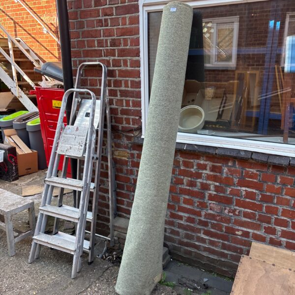 Roll of carpet remnant for home improvement and DIY projects.