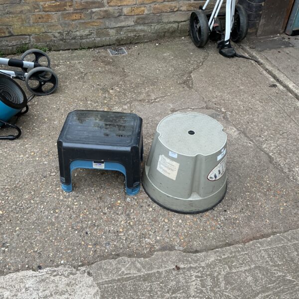 Plastic rolling step stool for light work and access.