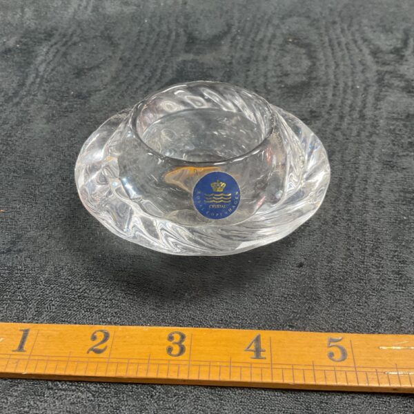 Royal Copenhagen Capriole tea light holder with swirl design.
