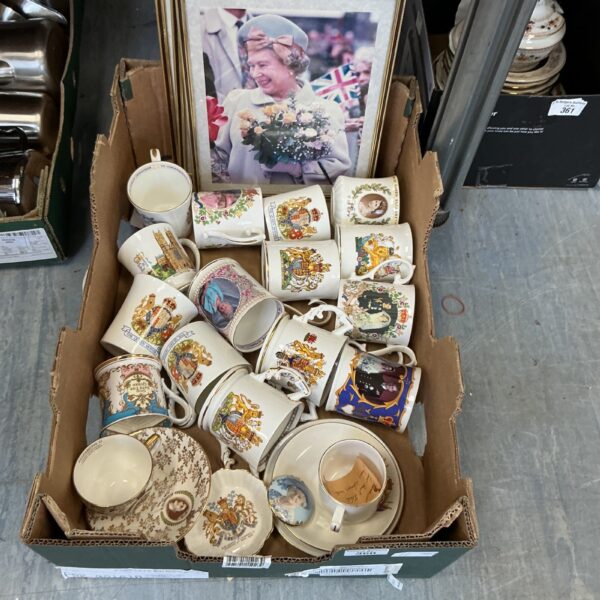 Collection of vintage Royal Family commemorative porcelain mugs.
