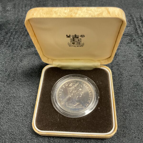 Royal Mint 1980 Queen Mother crown coin in presentation case.