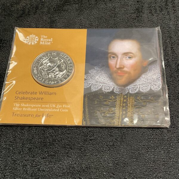 Sealed Royal Mint Shakespeare silver coin in original packaging.