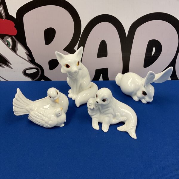Royal Osborne porcelain animal set featuring fox, rabbit, and seals.