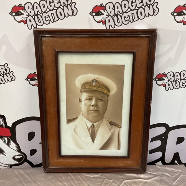 Vintage framed portrait of a Russian Navy Captain in monochrome.