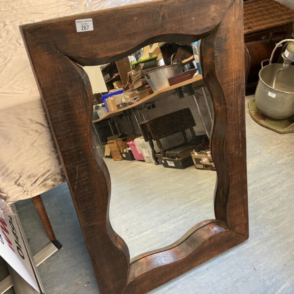 Dark wood rustic framed mirror for farmhouse decor.