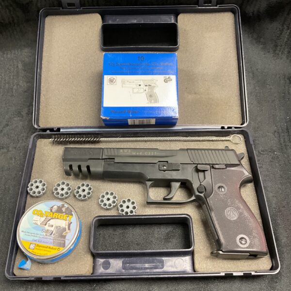 RWS C225 CO2 pistol with box of gas canisters and spare magazines.