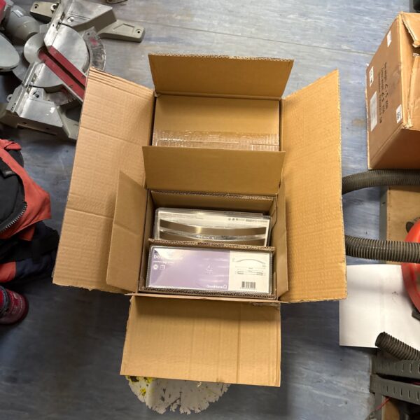 Box of twenty-four Sabaku bow handles for archery.