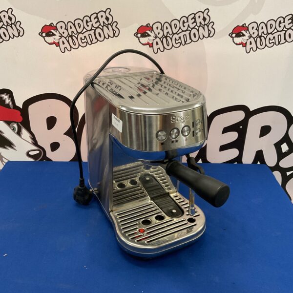 Silver Sage Barista Express BES875UK coffee machine in a kitchen setting.