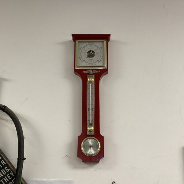 Vintage SB aneroid wall barometer for home weather monitoring.