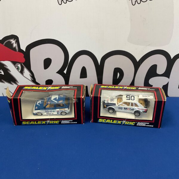 Vintage Scalextric C149 and C376 racing cars in original packaging.
