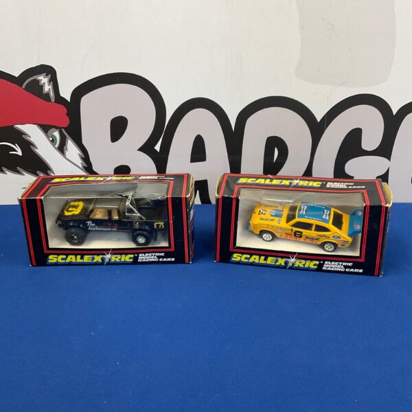 Vintage Scalextric racing car pair, Datsun and Ford Capri.