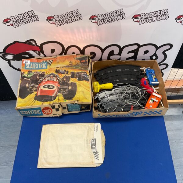 Vintage Scalextric Sports 30 racing set in its original box.