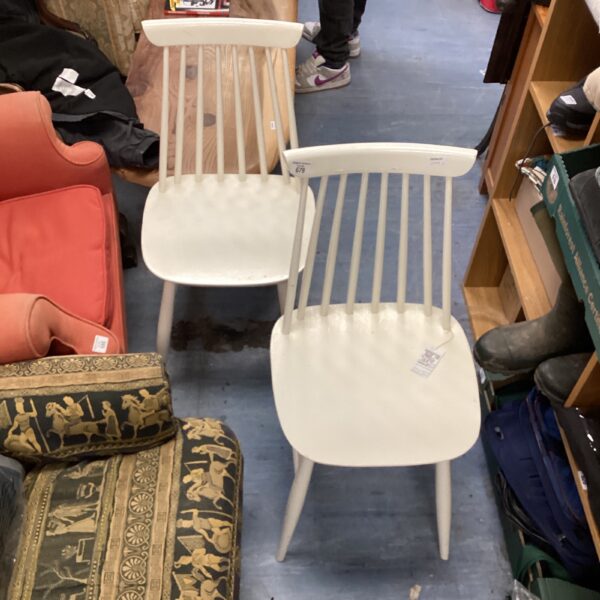 Pair of vintage Scandinavian designer chairs with spindle backs.