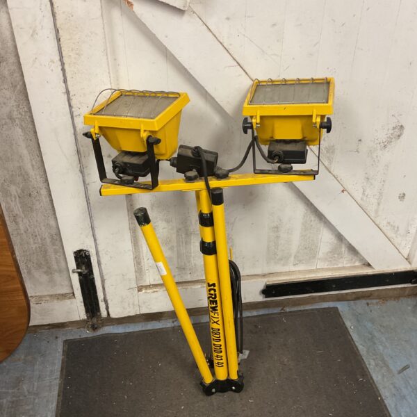 Screwfix double site lights on a tripod stand for construction.