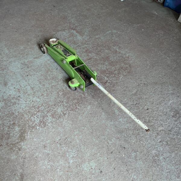 Sealey 3 tonne trolley jack for automotive repair and maintenance.