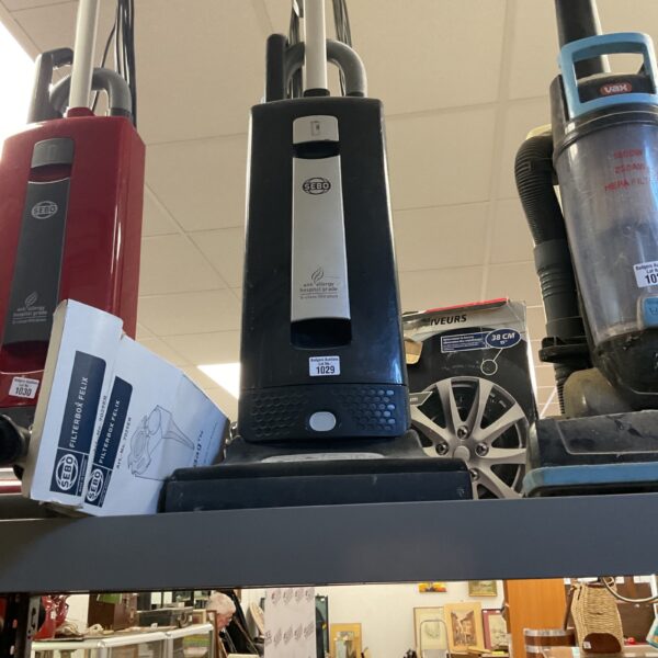 Black Sebo Automatic X4 upright vacuum cleaner for home use.