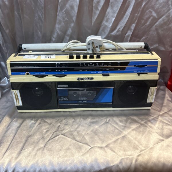 Vintage Sharp QT-242 stereo cassette recorder with radio.