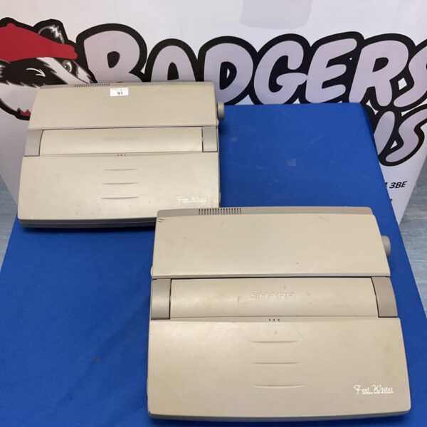 Vintage Sharp word processor, portable typewriter, 1980s technology.
