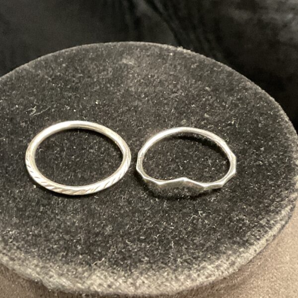 Silver band and wishbone rings, size N and O.