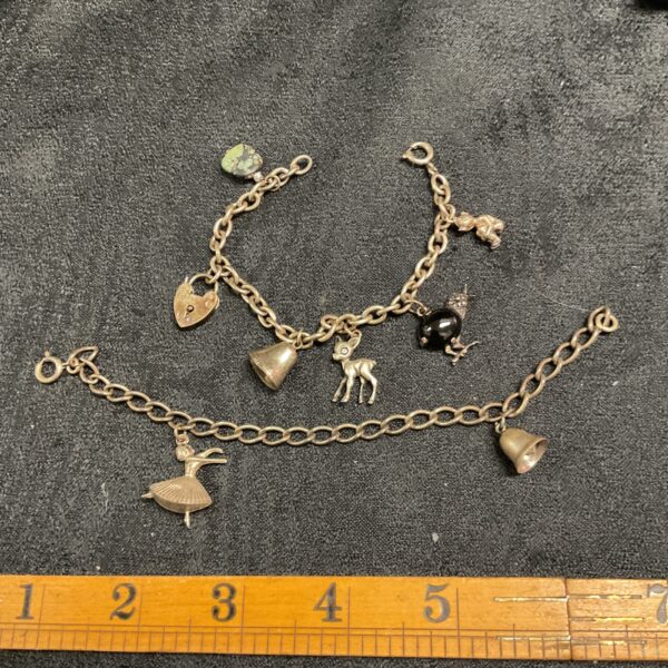Vintage silver charm bracelet with ballerina and horse charms.