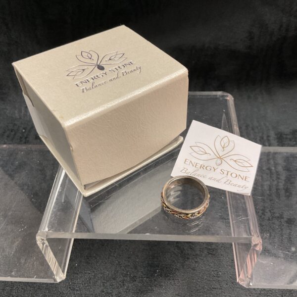 Silver energy stone ring size N, detailed close-up.