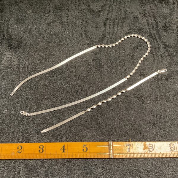 Matching silver necklace and bracelet set in 925 sterling silver.