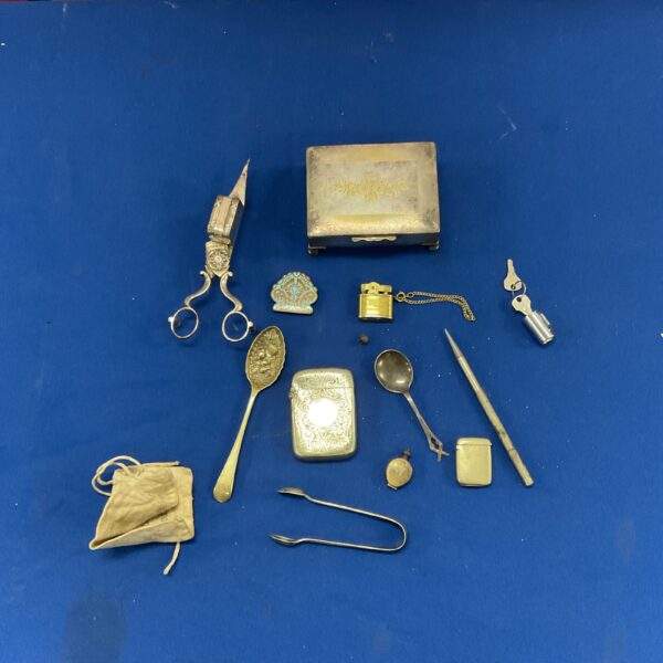 Vintage silver plated collectibles lot with cigarette box and holders.