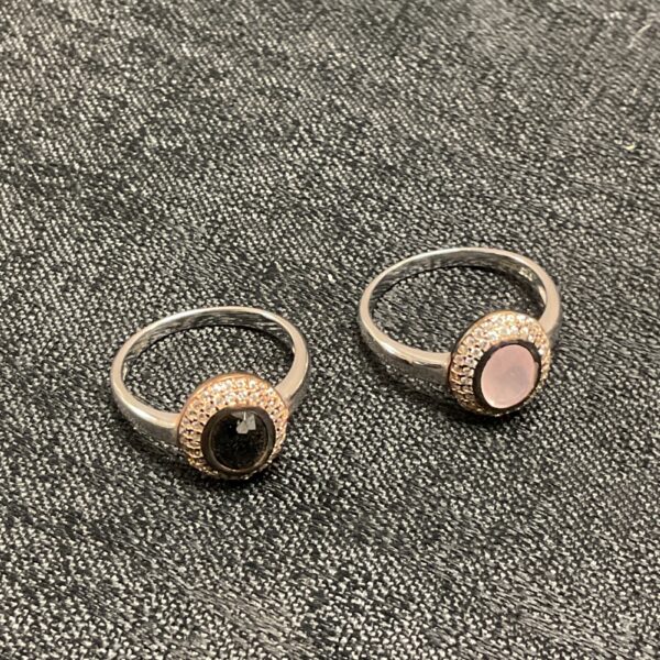 Silver ring pair with dark and pink stones, fashion jewellery.