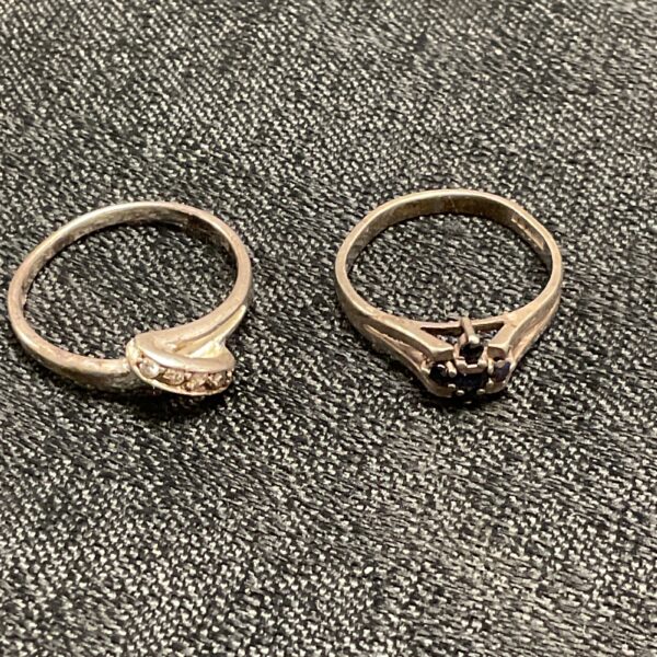 Silver ring with clear stone, size L/M.