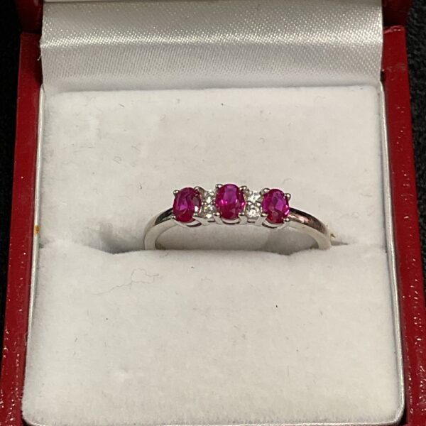 Silver ruby trilogy ring size P, elegant gemstone jewellery.