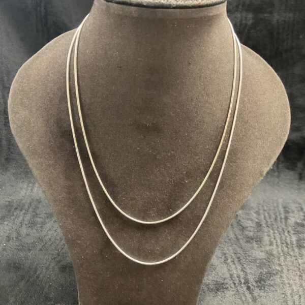 Silver snake chain necklaces set, 16 and 18 inch lengths.