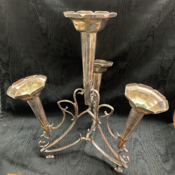 Vintage silverplate epergne centrepiece with pierced bowls for floral displays.