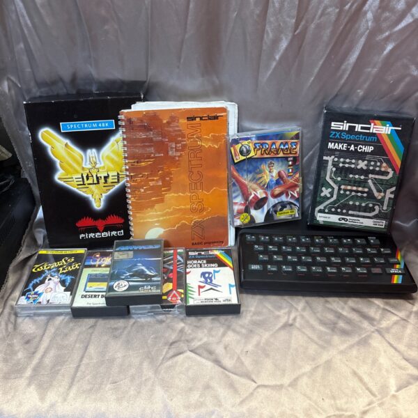 Vintage Sinclair ZX Spectrum 48K computer with game cassettes.