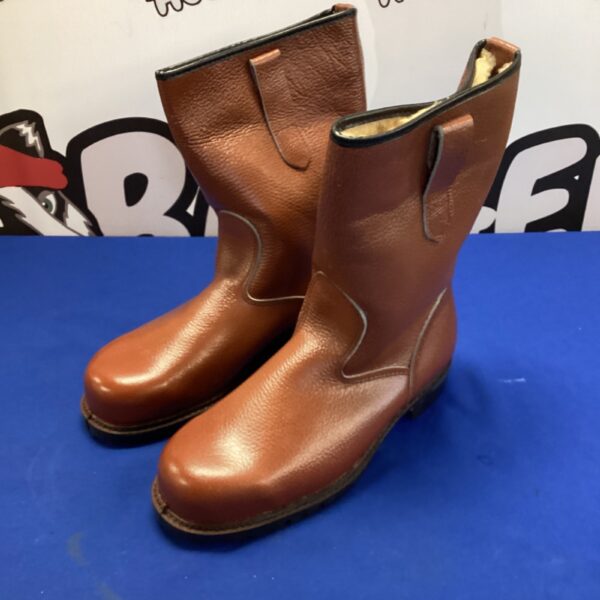 Vintage size 9 steel toe work boots for industrial use.