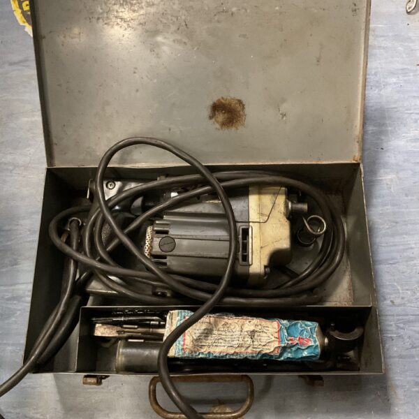 Vintage Skil roto hammer drill in its original carrying case.