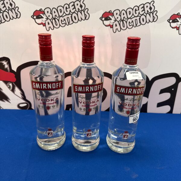 Lot of three Smirnoff vodka bottles for collectors.