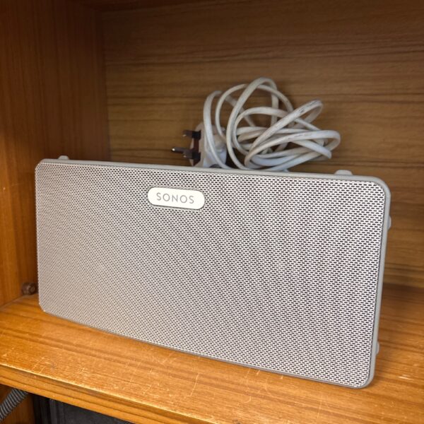 Front view of a black Sonos Play 3 wireless smart speaker.