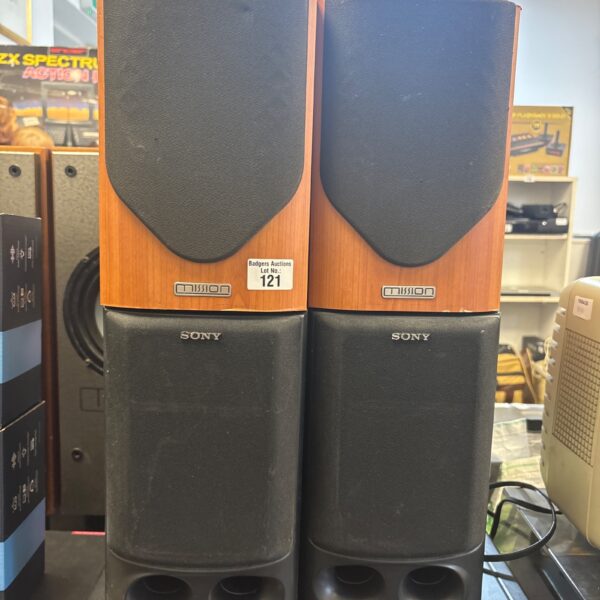 Vintage Sony and Mission speakers pair for audio enthusiasts.