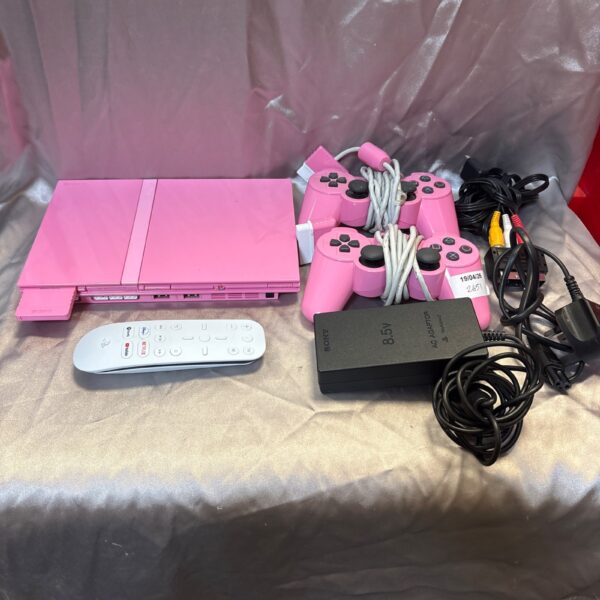 Pink Sony Playstation 2 Slim console with controllers and leads
