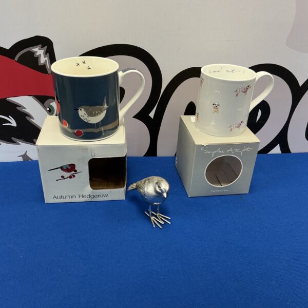 Sophie Allport robin mug and figurine set on display.