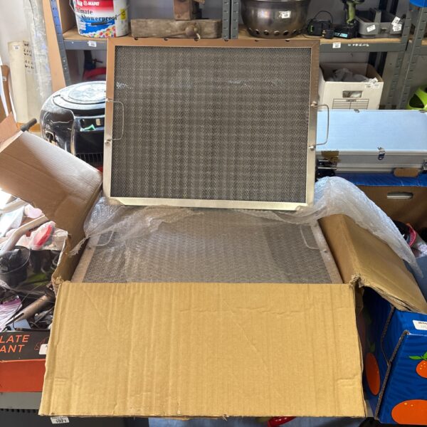 Lot of eleven stainless steel filter trays for industrial use.