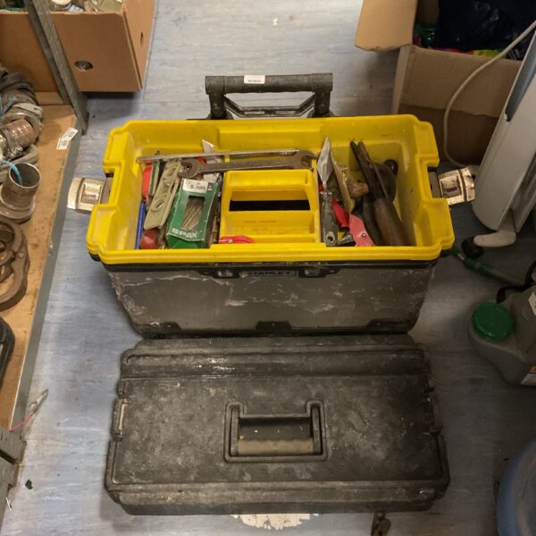 Yellow Stanley Fatmax toolbox with open lid and tools inside.